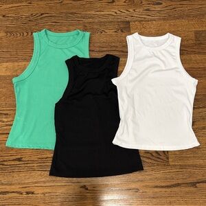 Set of Three Sleeveless Tops - Green, Black, White